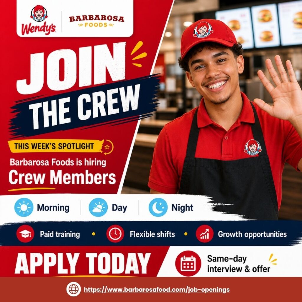 Smiling Wendy's crew member waving in red uniform — guide to the Wendy's hiring process and job interview preparation at Barbarosa Foods