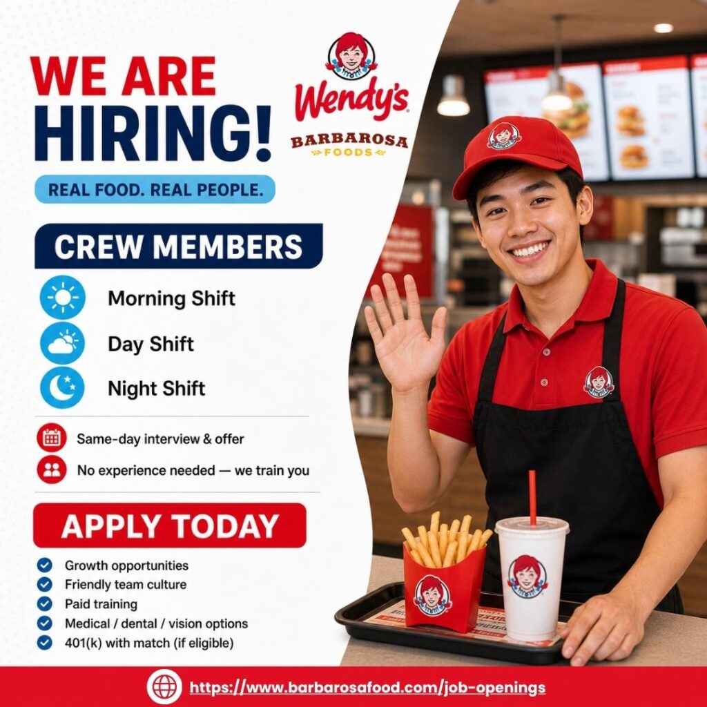 Smiling Wendy's crew member in red uniform waving — Barbarosa Foods hiring guide on how to prepare for a job interview and get hired same-day